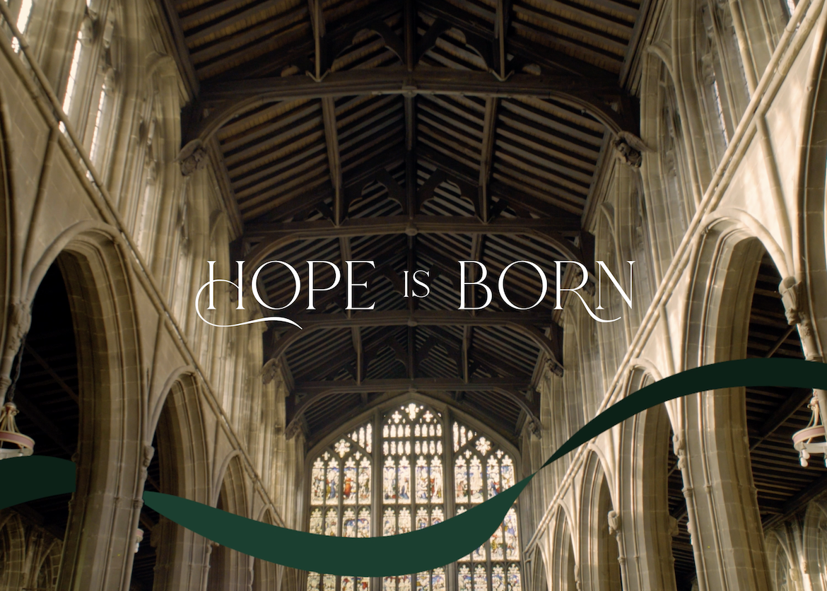 Church roof image with text 'Hope is Born'