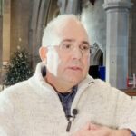 man in church in interview